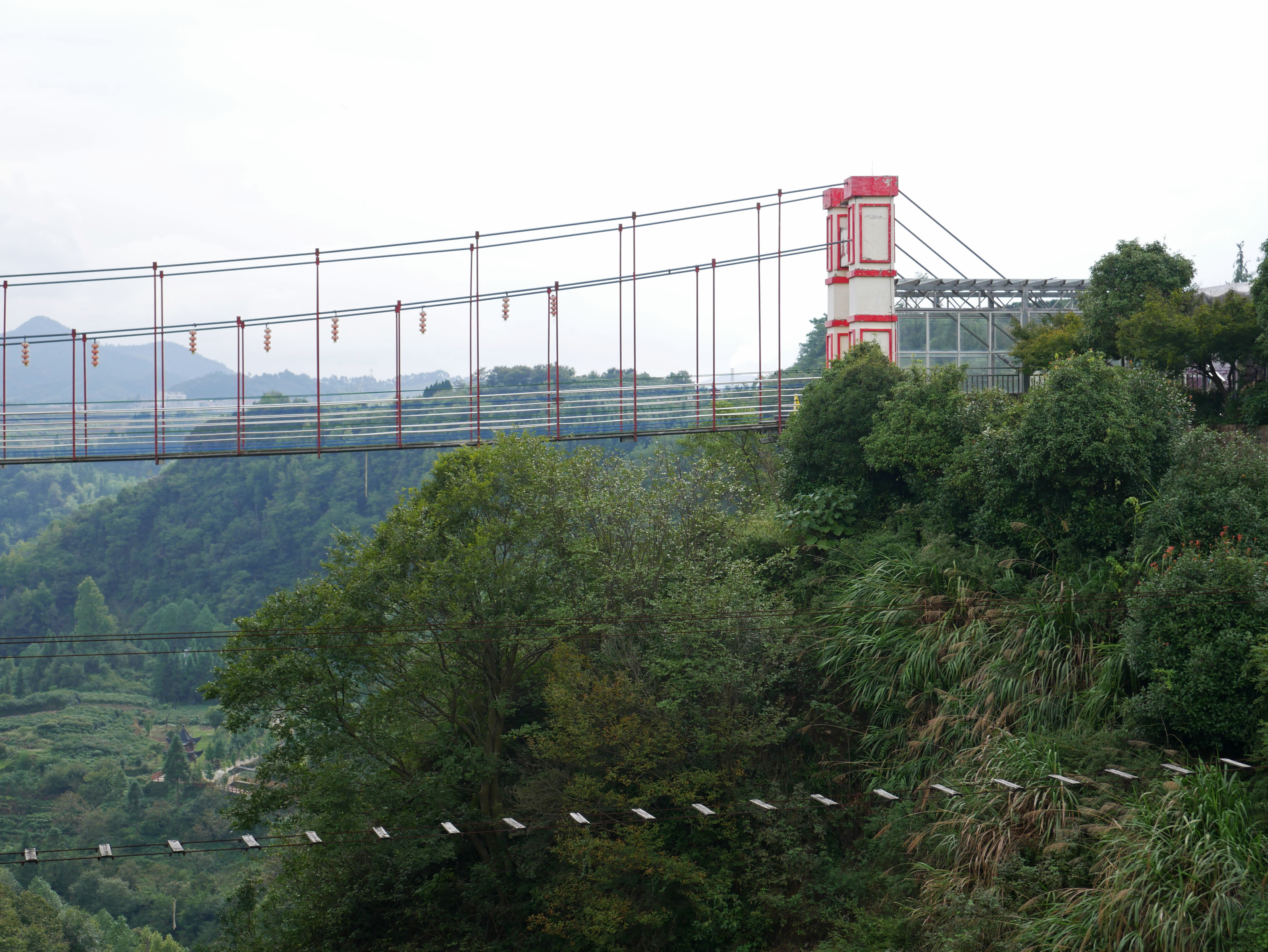 WulongGorgeFootbridgeTowerCloseSky.JPG