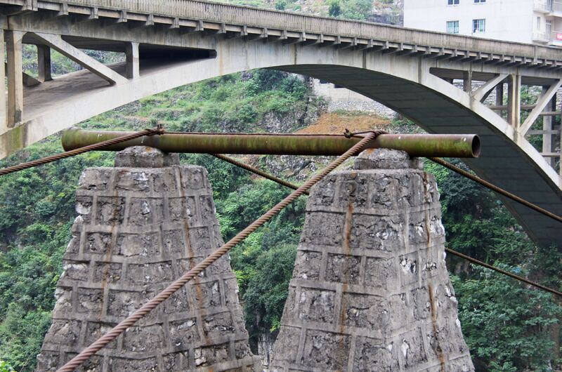 File:LuoluFootbridgePipeCross.jpg