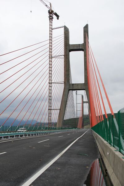 File:WuzuoheCableStayedTowerFromRoad.jpg