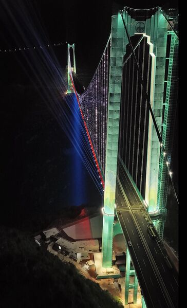 File:HuajiangNightGreenYellowTower.jpg