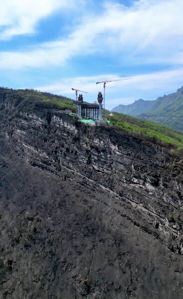 File:TianmenWestTowerCliffSky.jpg