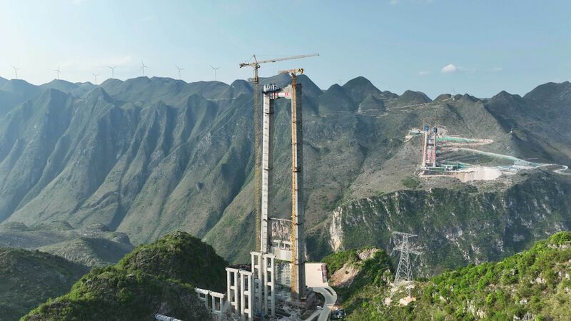 File:HuajiangTowersMountainsPower.jpg