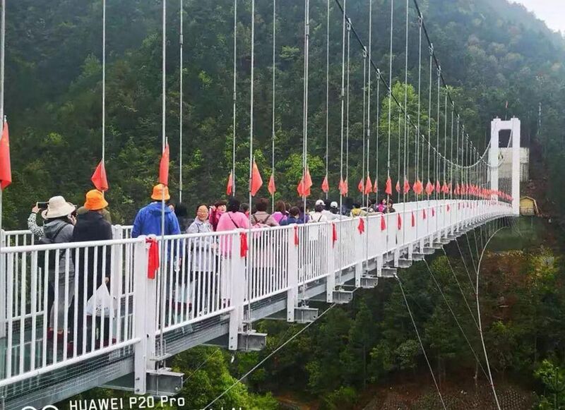 File:LongmenGlassFootbridgeProb130mtrSpan.jpg