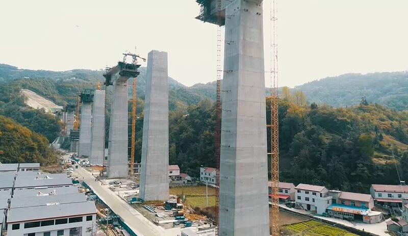 File:TianchiRailwayDroneBuildings.jpg