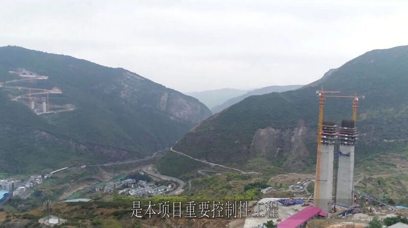 File:Chishuihe Bridge ChajiaotanTwoTowersDrone.jpg