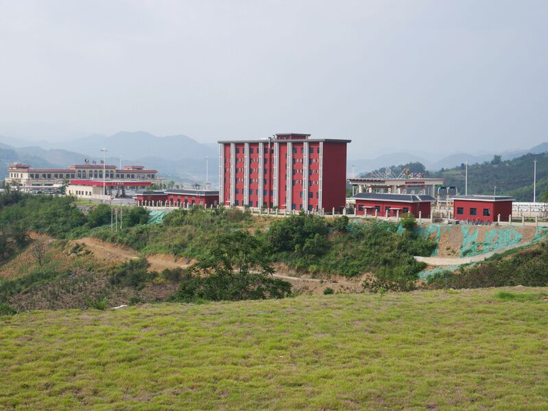 File:S26 ExitBuildingWide.JPG