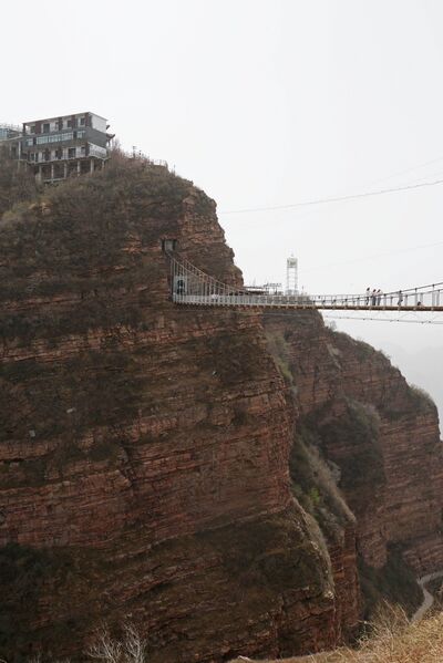 File:WudangshanFootbridgeRock.JPG