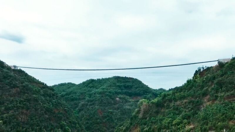 File:LongguashanFootbridgeGreenMountains.jpg