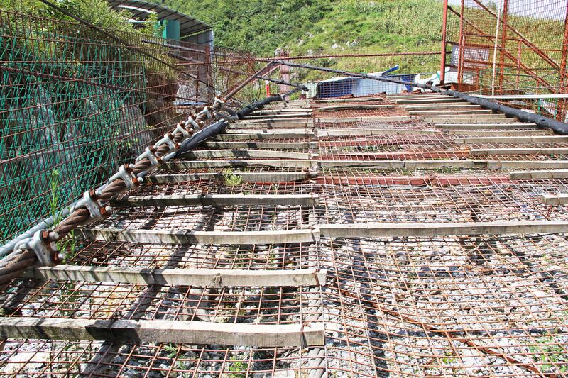 File:DimuheFootbridgeOnGround.jpg