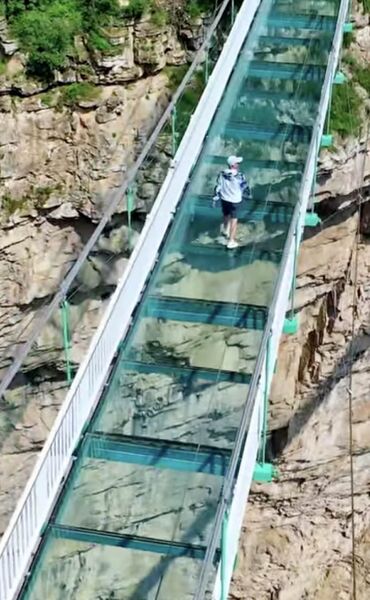 File:TianjishanGlass FootbridgePerson.jpg