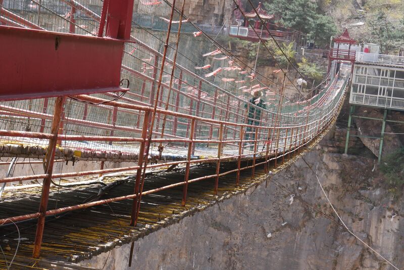 File:Tianjishan FootbridgeOldPerson.JPG