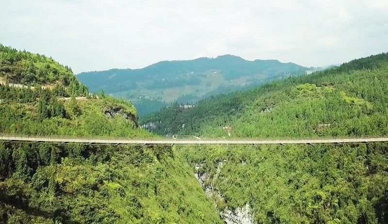 File:Shuangbao FootbridgeSideSun.jpg