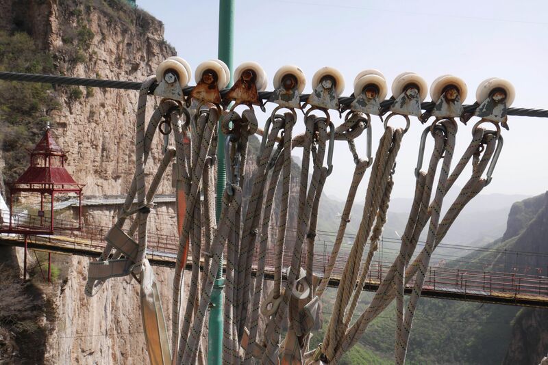 File:Tianjishan FootbridgeHarnessWheels.JPG